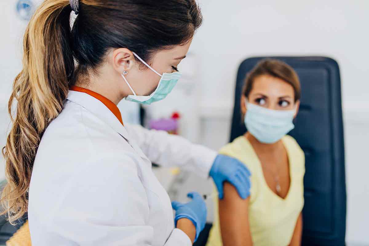 woman getting flu shot