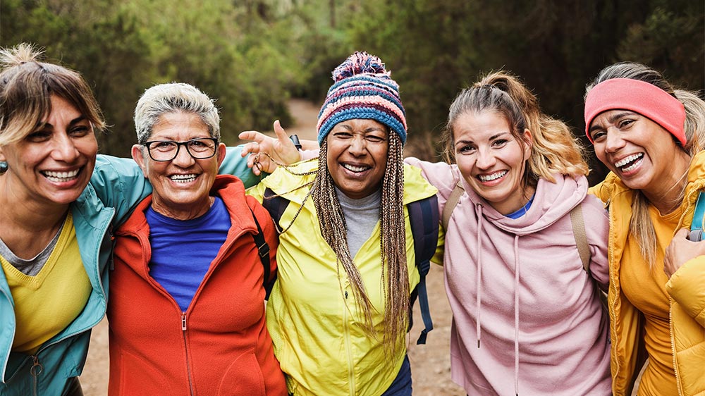 diverse group of women hiking