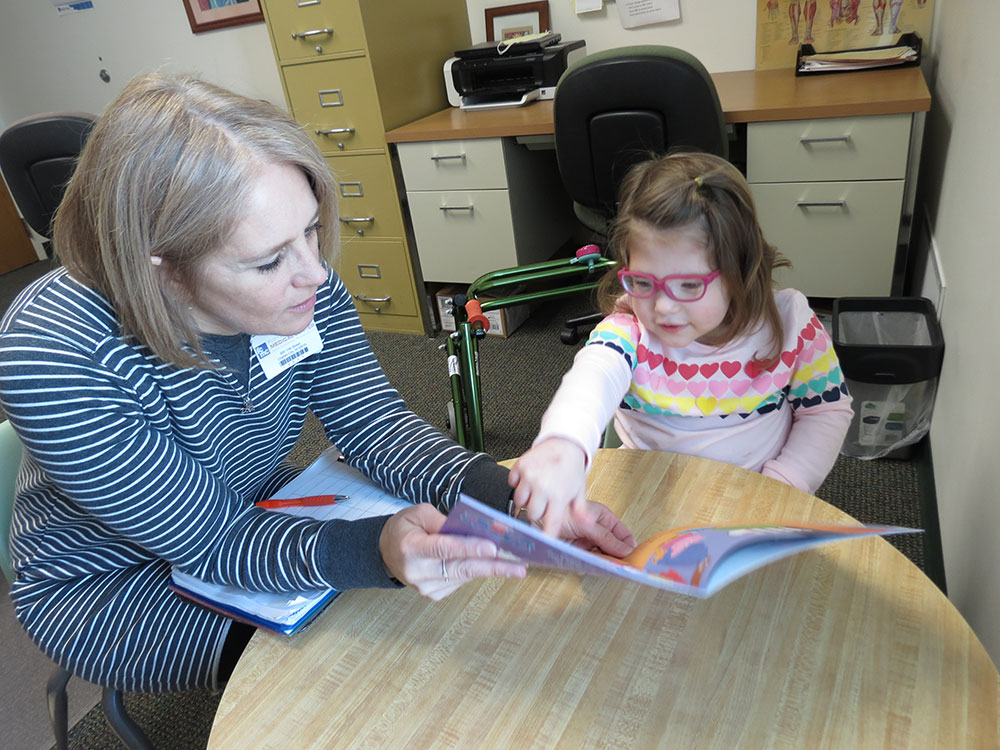 woman and child reading